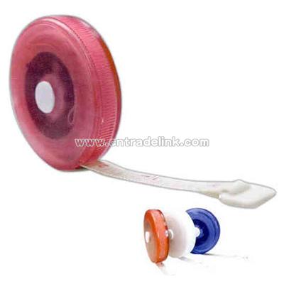Round tape measure with button retract